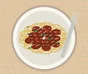 Spagettia bolognesekastikkeella, parmesaanilla ja basilikanlehdillä